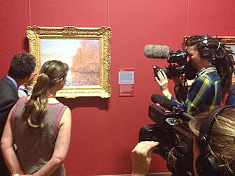 Damaged Monet painting back on...